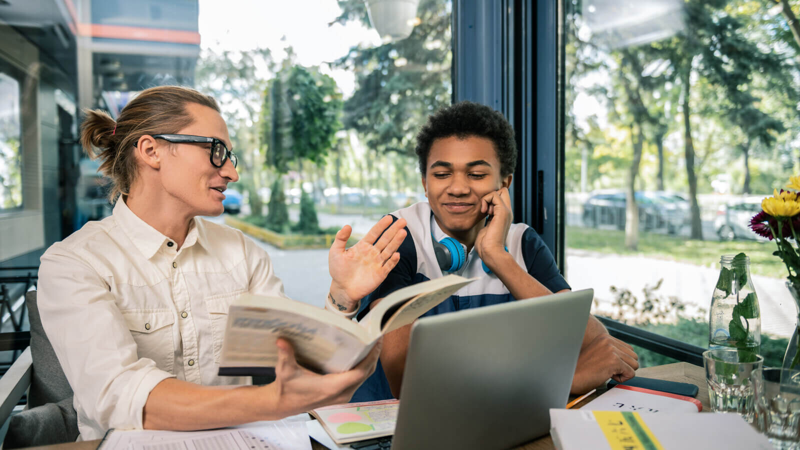 A student job shadows an employee