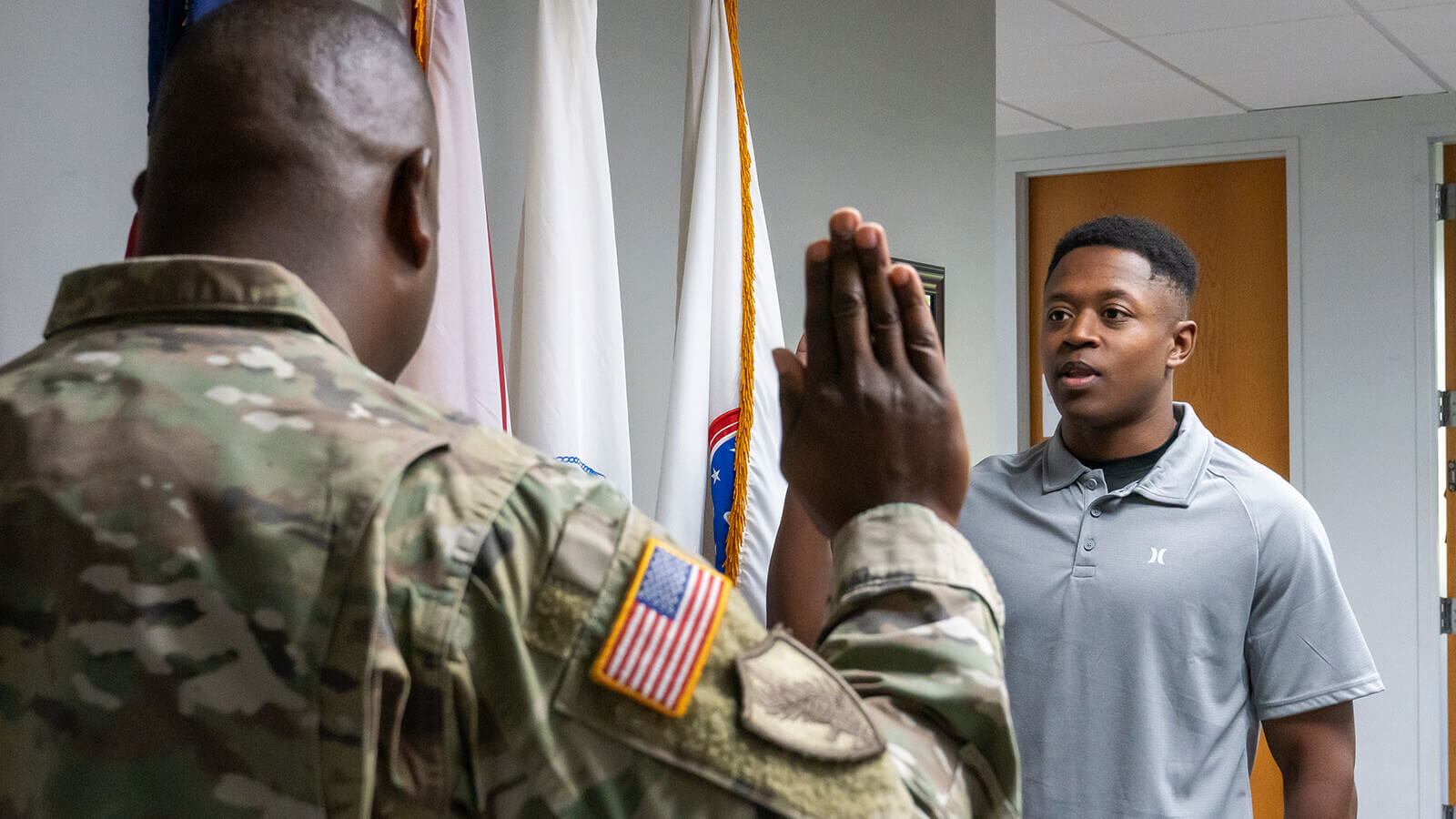 a military commander swears in a new cadet
