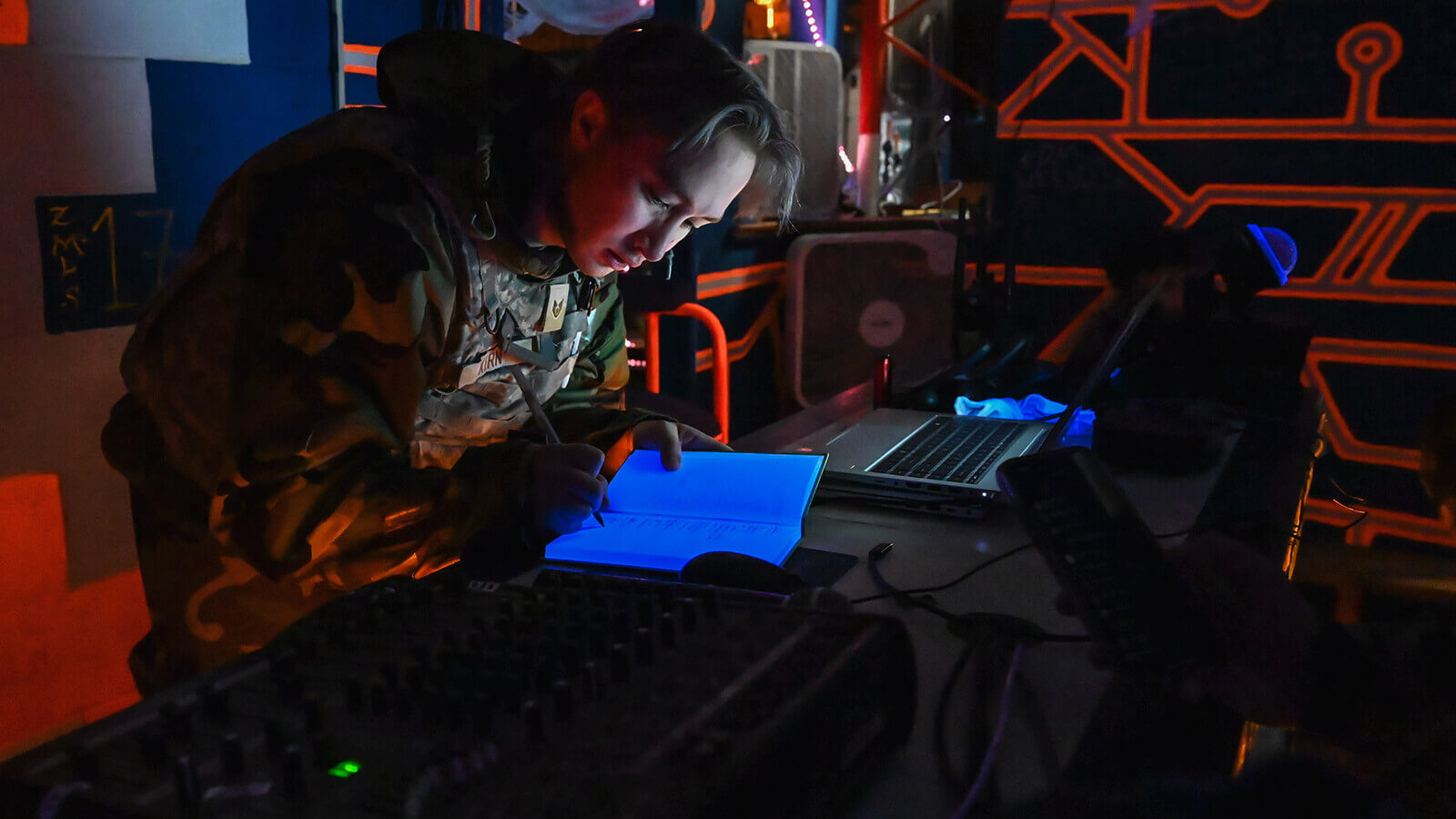 Air Force member studying their notes