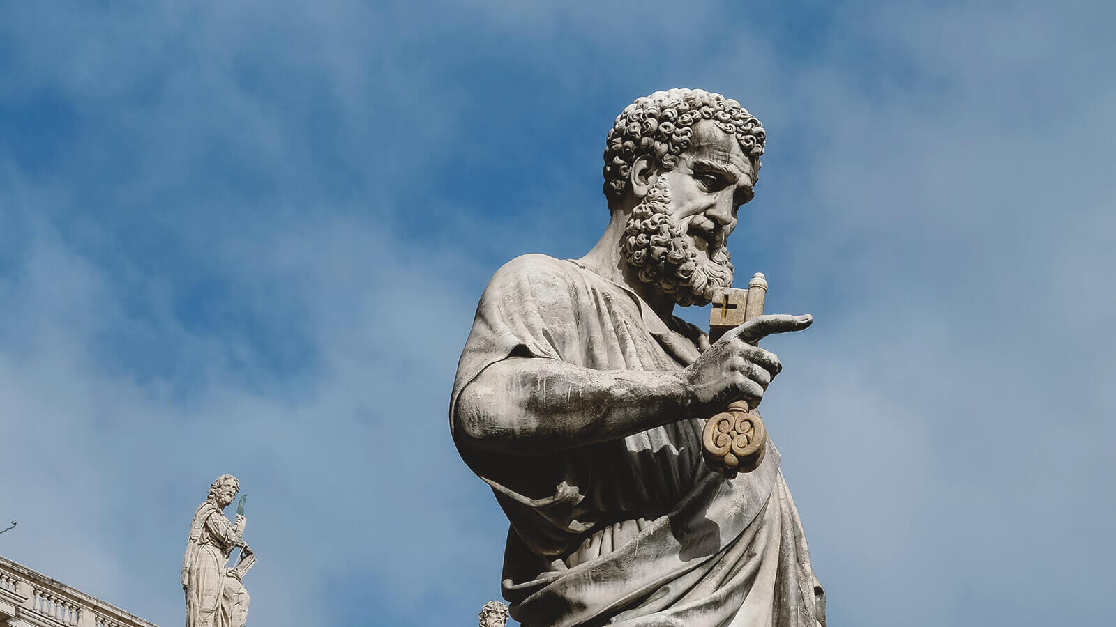 a greek statue on a college campus