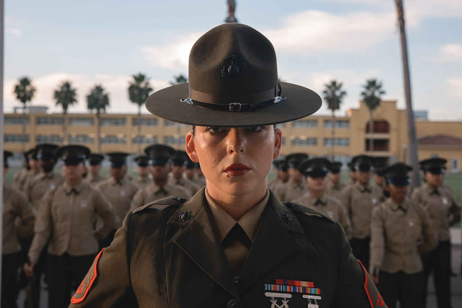 A Marine stands in full dress uniform