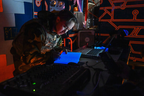 Air Force member studying their notes